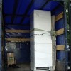 Перевозка высоких холодильников вертикально-стоя с грузчиками.